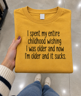 I Spent Childhood Wanting To Be Older Now It Sucks T-Shirt