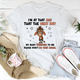 I’M AT THAT AGE WHERE THE NEXT DAY MY BODY WHISPERS TO ME: PLEASE DON’T DO THAT AGAIN T-Shirt