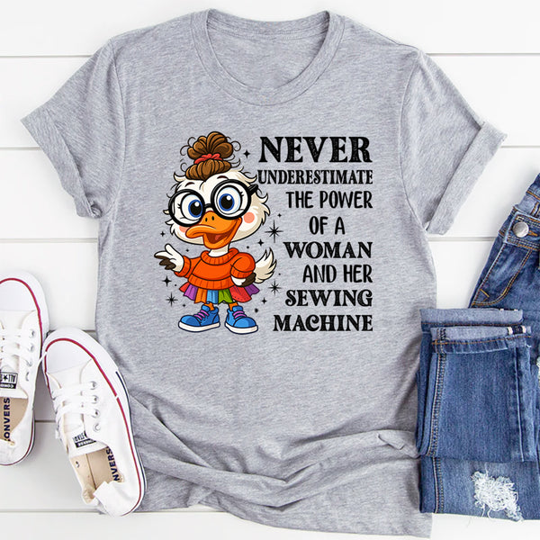 Never Underestimate the Power of a Woman and Her Sewing Machine T-Shirt