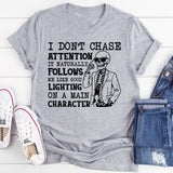 I Don’t Chase Attention, It Naturally Follows Me Like Good Lighting on a Main Character T-Shirt