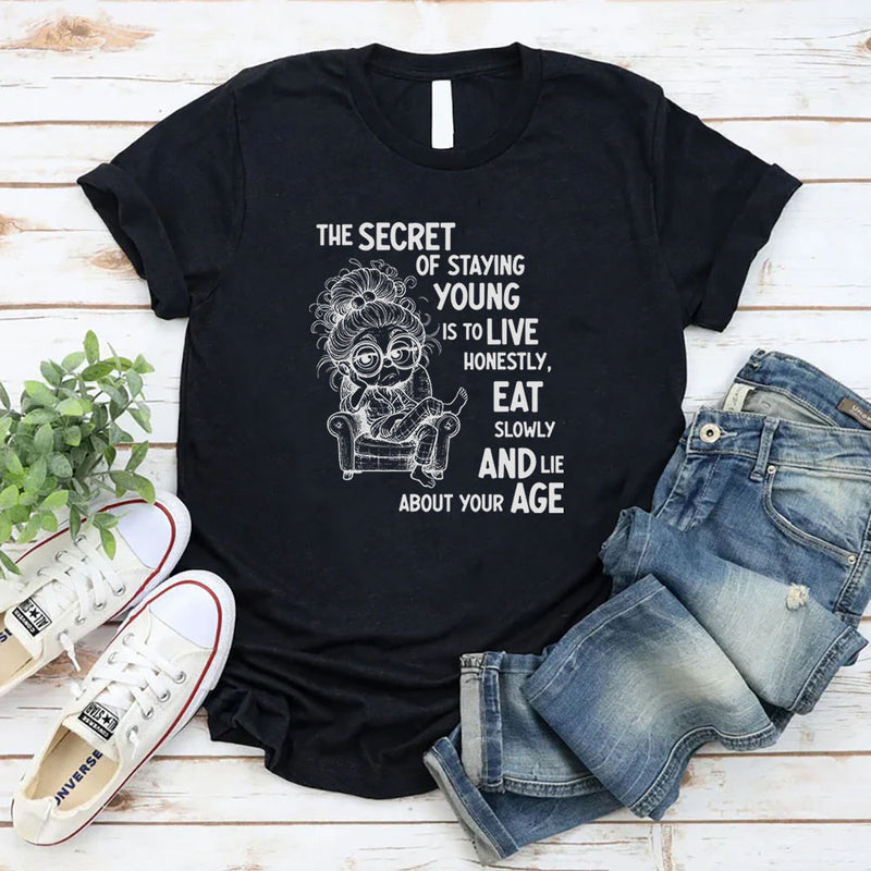 The Secret of Staying Young Is to Live Honestly, Eat Slowly, and Lie About Your Age T-Shirt