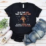 I’M AT THAT AGE WHERE THE NEXT DAY MY BODY WHISPERS TO ME: PLEASE DON’T DO THAT AGAIN T-Shirt