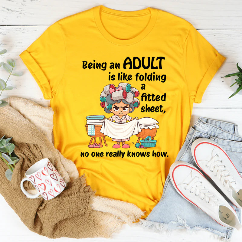 Being An Adult Is Like Folding A Fitted Sheet No One Really Knows How  T-Shirt
