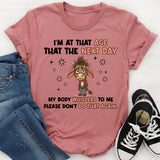 I’M AT THAT AGE WHERE THE NEXT DAY MY BODY WHISPERS TO ME: PLEASE DON’T DO THAT AGAIN T-Shirt