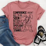Confidence Doesn’t Beg to Be Seen, It Naturally Becomes the Spotlight Wherever It Stands T-Shirt