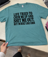Life Tried To Chew Me Up And Shit Me Out. But I'm Built Like Corn T-Shirt