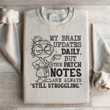 My Brain Updates Daily, But the Patch Notes Are Always ‘Still Struggling Sweatshirt